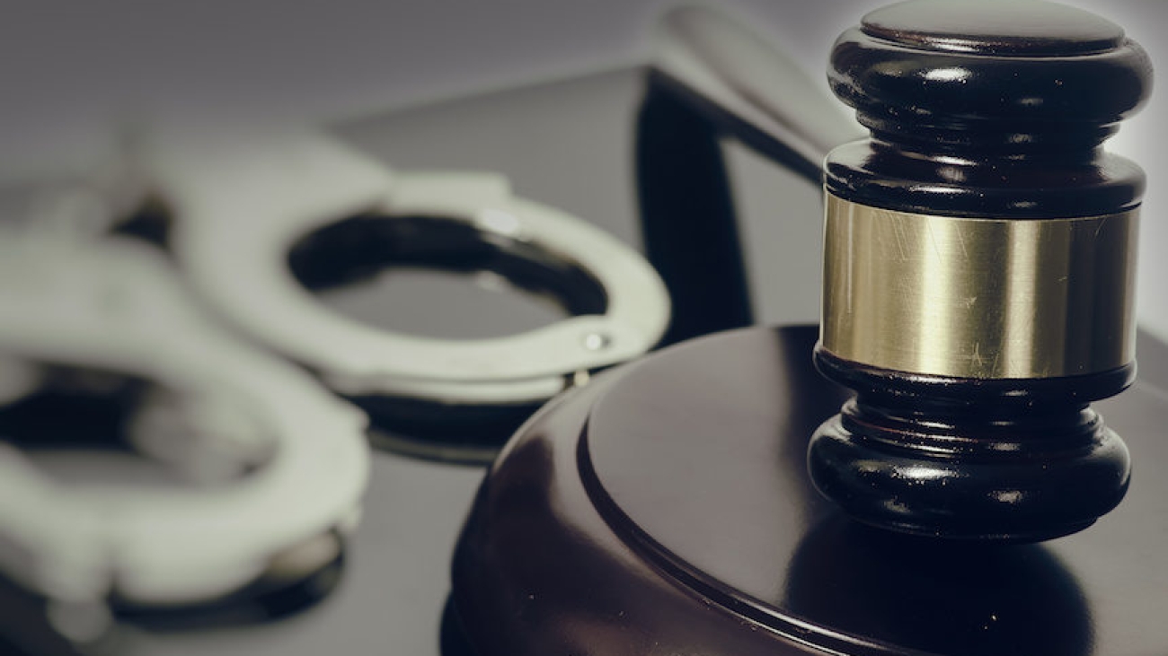 Legal law concept image - gavel and handcuffs