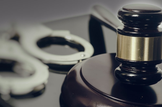 Legal law concept image - gavel and handcuffs